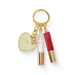 Фото Золотой брелок с блесками для губ 1