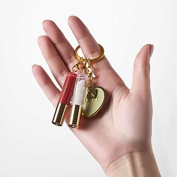 Фото Золотой брелок с блесками для губ 3