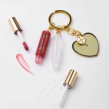 Фото Золотой брелок с блесками для губ 4